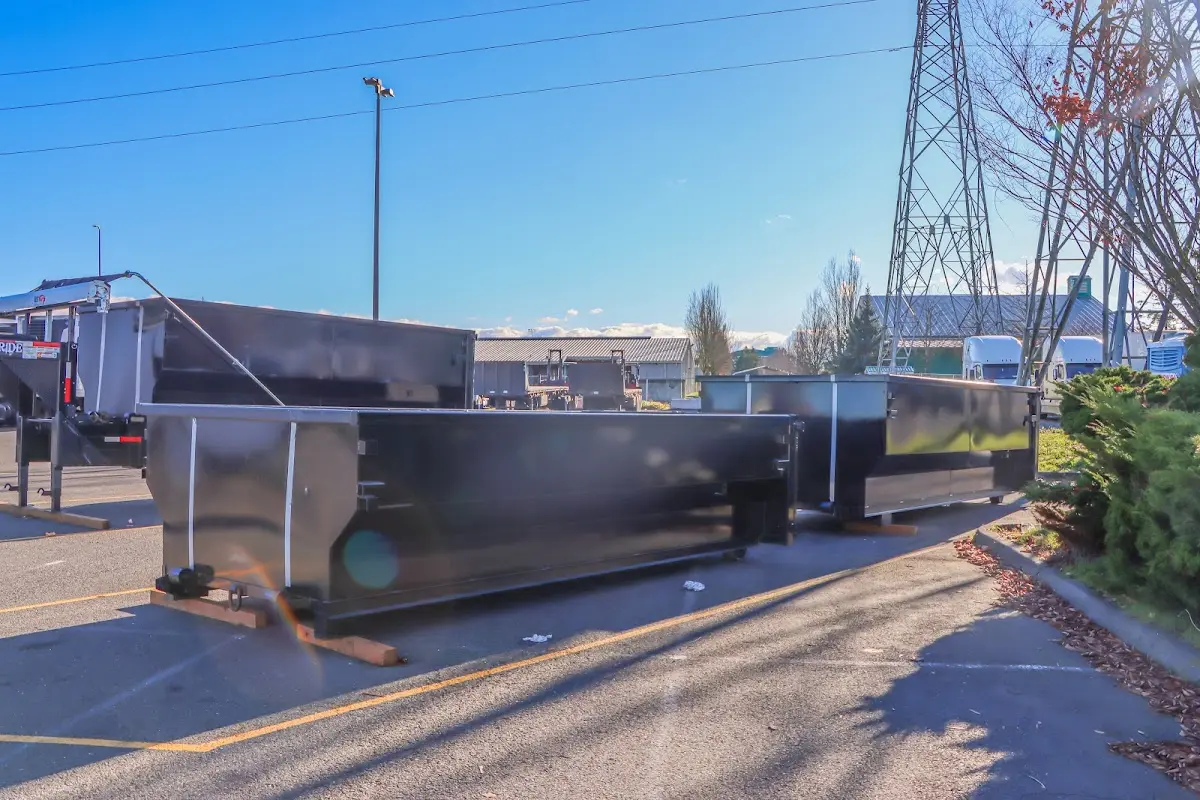 Roll-off dumpster ready for waste disposal at job site for 6 Yard Dumpster Rental in Gladstone